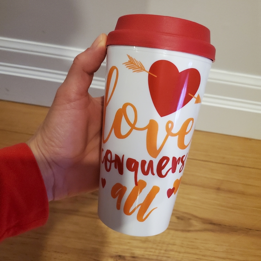 Nwt "love conquers all" travel mug